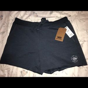 Dark blue Vans Off The Wall shorts.